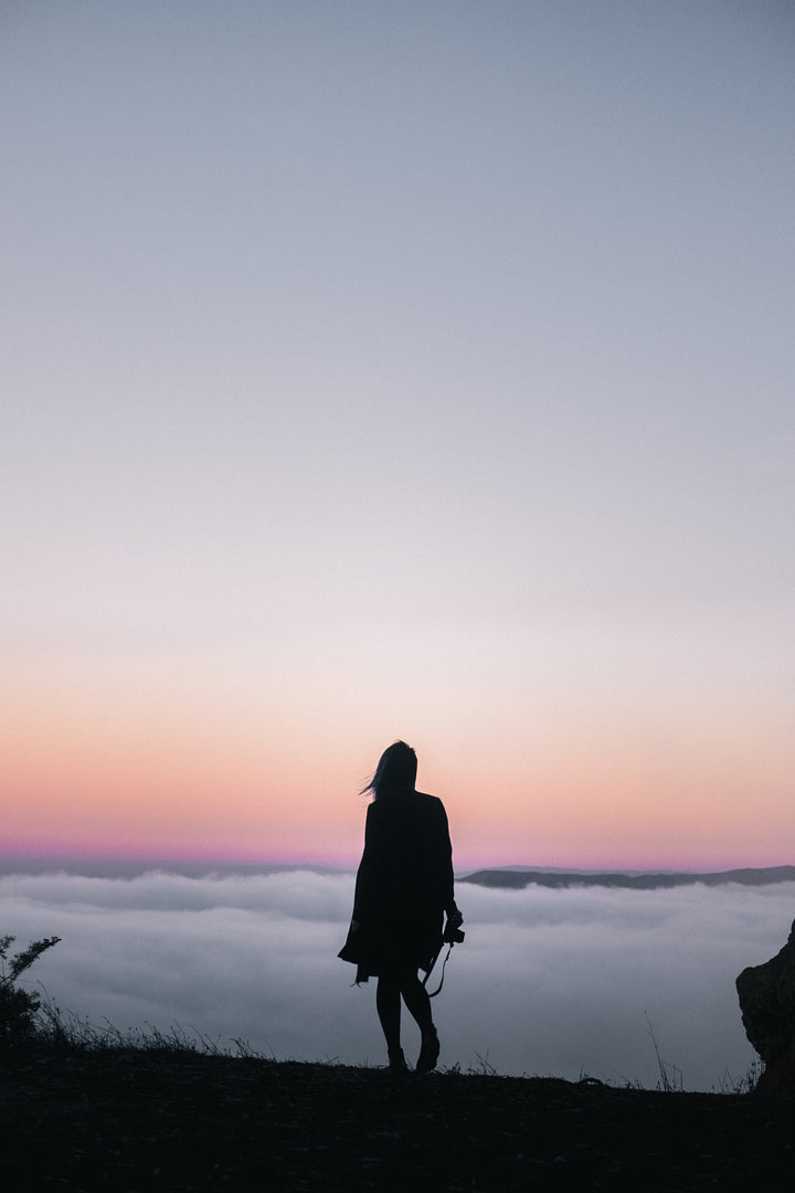 hiking-above-clouds-at-sunset - Odyssey Street